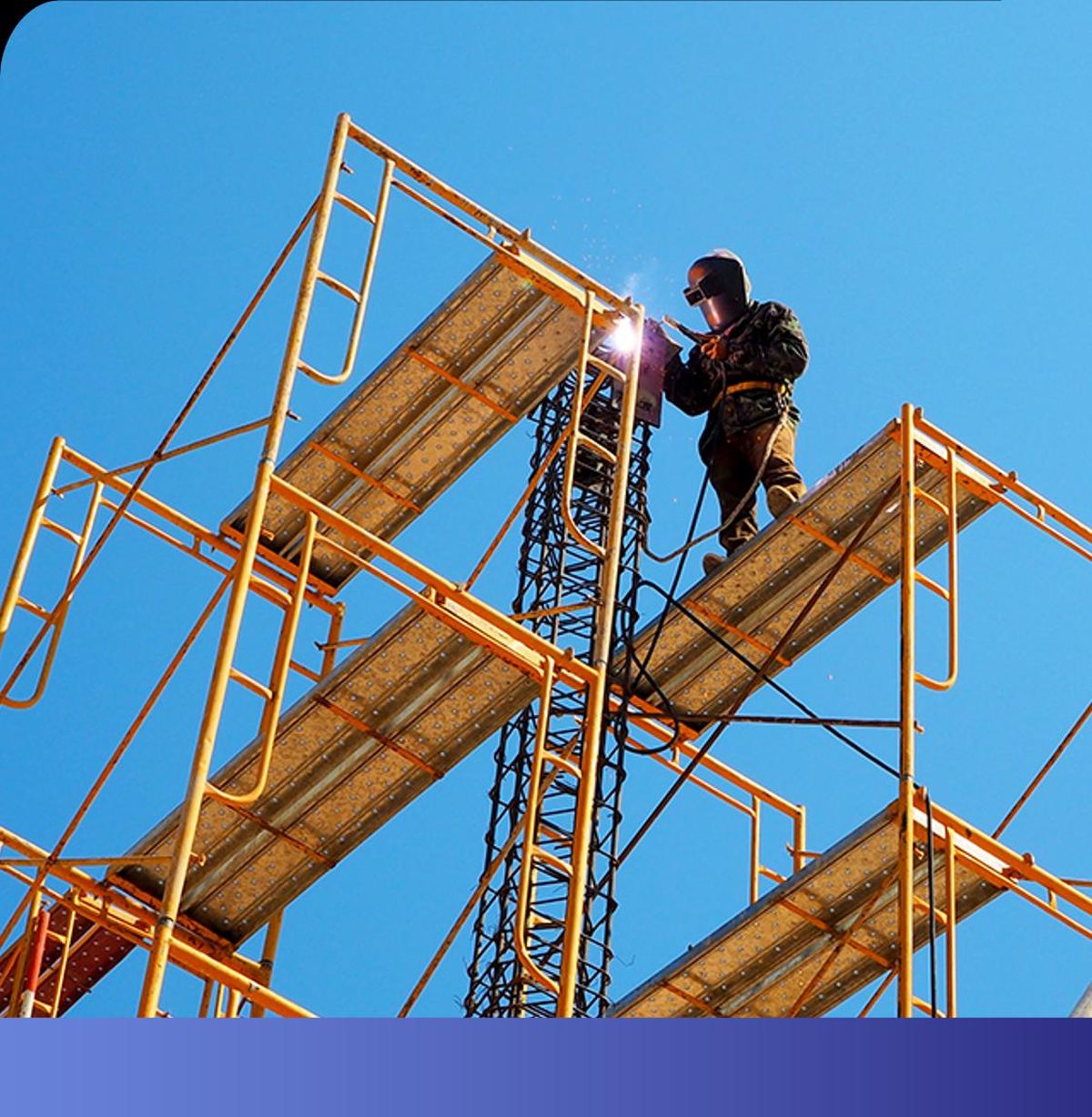 Welder at height on structural steelwork