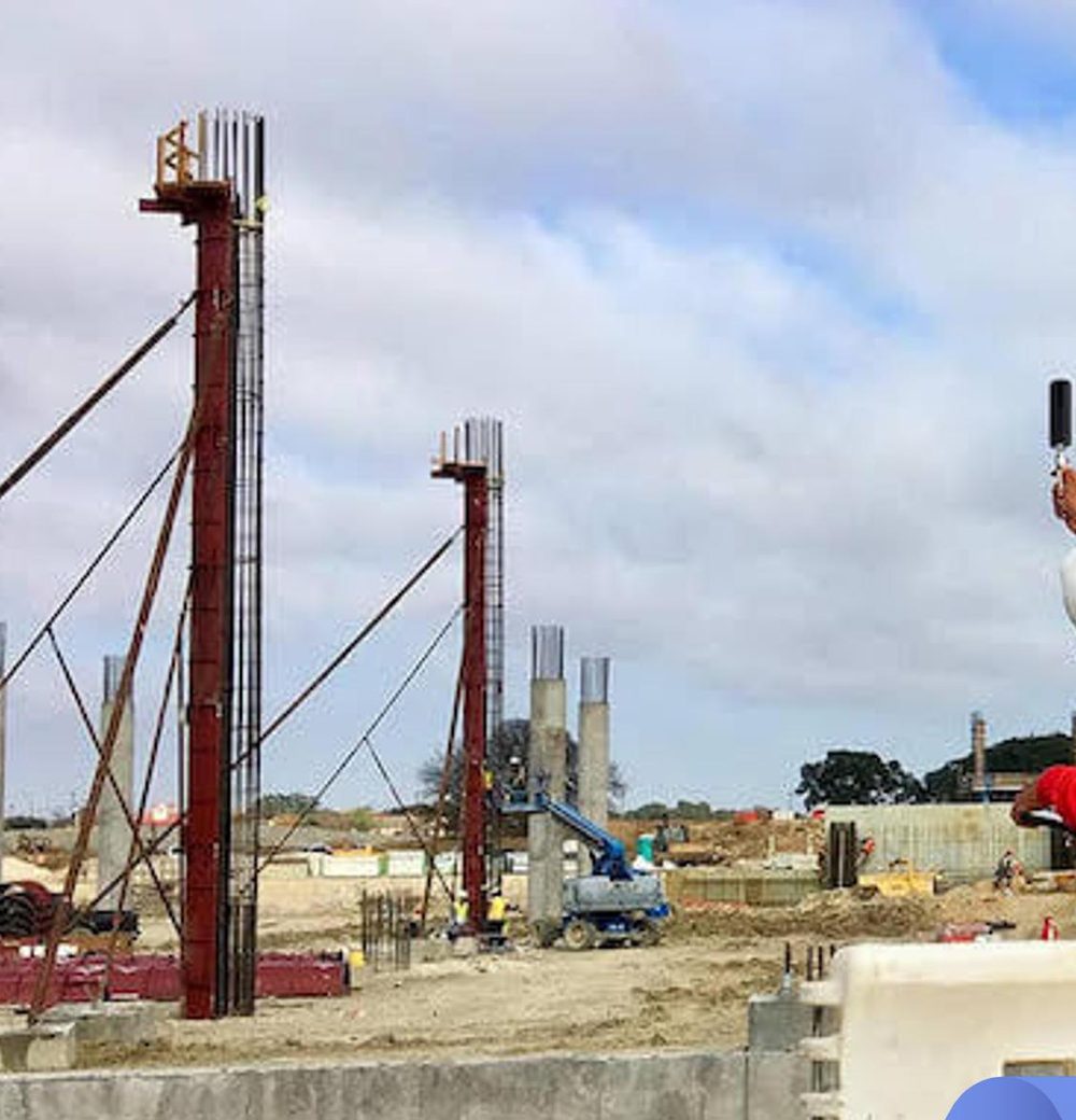 Civil works — column and formwork erection on an active site